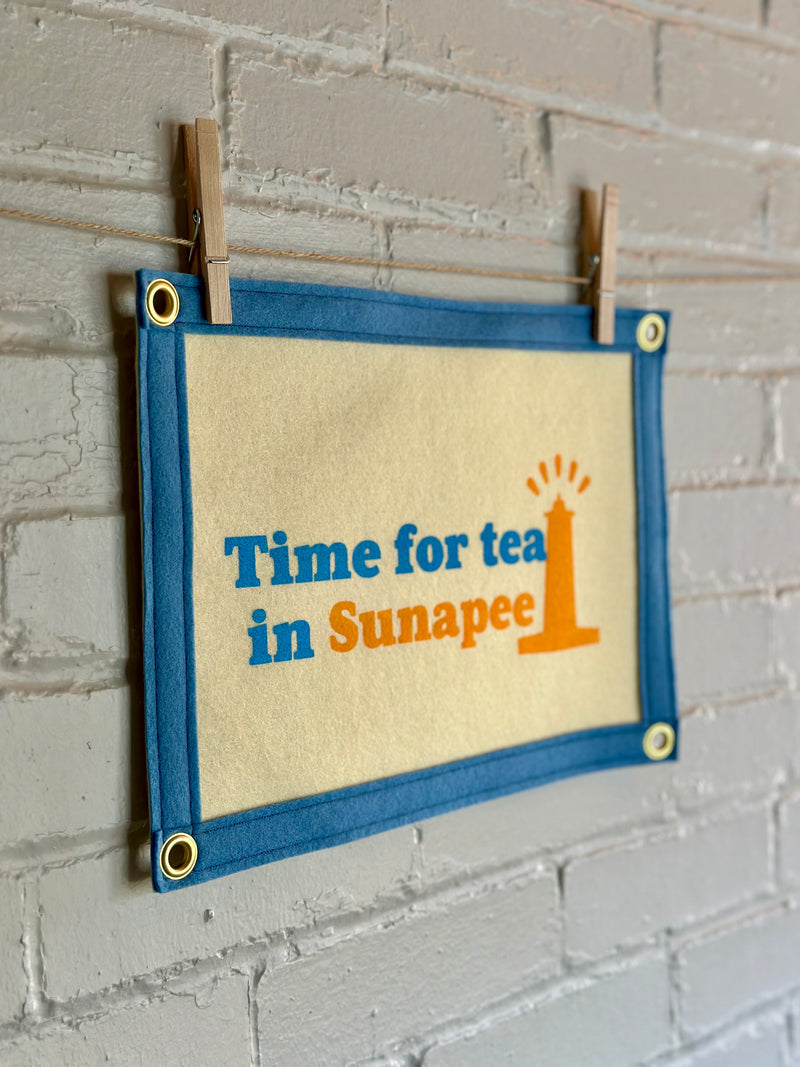 Felt banner reading "Time for tea in Sunapee"
