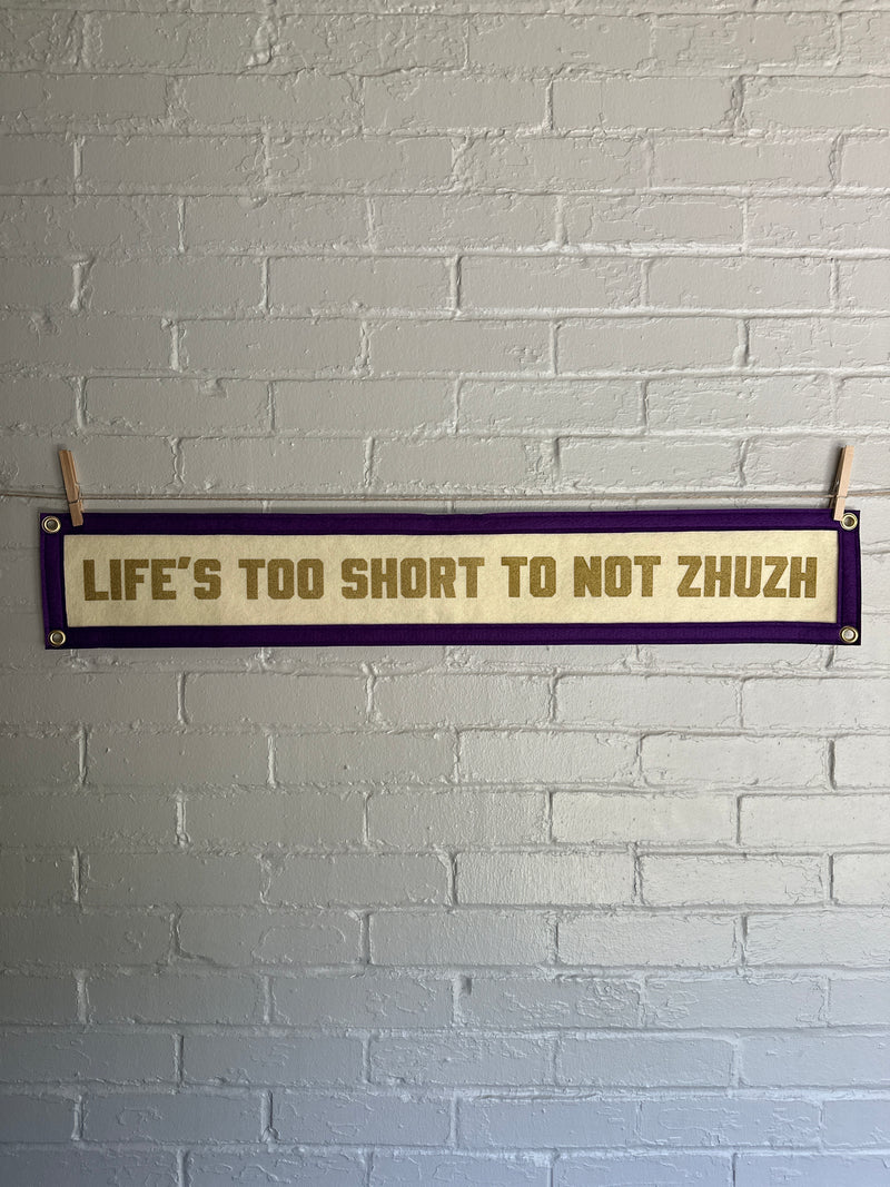 Motivational banner with text on a textured wall