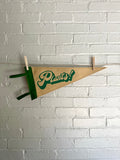 A light brown felt pennant with green trim and green lettering that reads "Plants!"